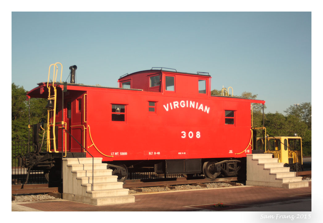 Restored Virginian Railway Caboose #308 on display outside the museum